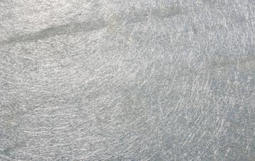 Islibhig laminate fibreglass or shingles?